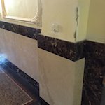 Travertine and Dark Emperador Marble